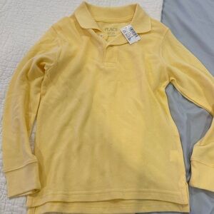 New with tags. Kids yellow polo. From The Children’s Place. Size Small.